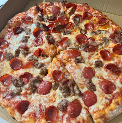 Round sausage and pepperoni pizza from The Original Buscemi's